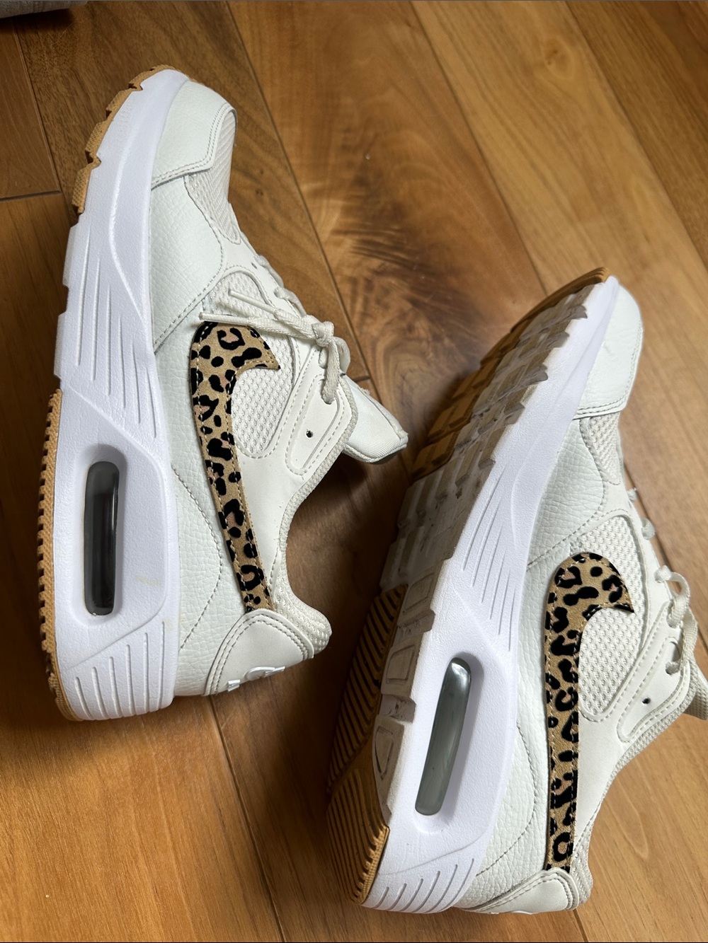 Nike Air White Women's Athletic Sneakers with Leopard Accent
